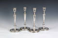 Set of four Georgian silver candlesticks