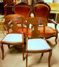 Two Victorian Upholstered Carved Walnut Parlor Armchairs and a Pair of Empire Mahogany and Mahogany Veneer Side