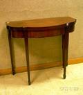 Georgianstyle Mahogany and Mahogany Veneer Swellfront Games Table