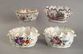 Pair of Meissen porcelain centerpieces with floral decoration and gilt trim