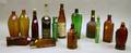 Fourteen Assorted Colored Glass Bottles
