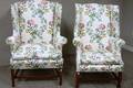 Two Chippendalestyle Upholstered Mahogany Wing Chairs