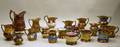 Collection of Thirteen English Lustreware Jugs and Five Mugs