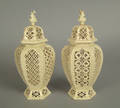 Pair of Leeds pottery creamware reticulated covered urns