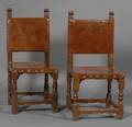 Pair of Renaissance Style Brass Studded and Leatherupholstered Walnut Side Chairs