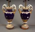 Pair of German Cobalt Blue and Gilt Porcelain Snake Handled Urn Lamp Bases