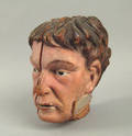 Carved and painted figure head of a gentleman 19th c
