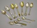 Group of Eleven Native American and Native Americanthemed Souvenir Spoons