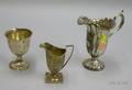 Sterling Silver Footed Cup Creamer and a Silver Plated Jug