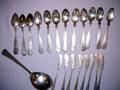 Twentyfive Pieces of F Porter Hammered Sterling Silver Flatware