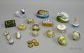 Collection of Halcyon Days Enamel Boxes and Assorted Porcelain Figural Boxes