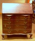 Chippendalestyle Carved Mahogany and Mahogany Veneer Serpentine Slantlid Desk