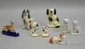Eight Small Staffordshire and Staffordshiretype Ceramic Dogs