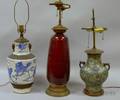 Chinese Champleve Lamp a Metalmounted Sang de Boeuf Glazed Ceramic VaseTable Lamp and a Chinese Blue and Wh
