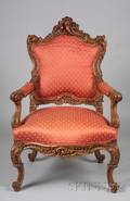 Fine Rococo Revival Carved Walnut Library Armchair