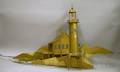 Goldpainted Metal Lighthouse Wall Sculpture