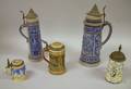 Five Decorated Stoneware and Ceramic Steins