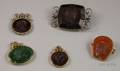Three Victorian Carved and Molded Glass IntaglioCameo Fobs and Two Brooches