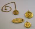 Four Art Nouveau Gilt Metal Lockets