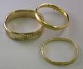 Two Goldfilled Bangles and One 14kt Gold Bangle