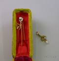 Three 14kt Gold and Pearl Stickpins and a Gold and Pearl Drop Pendant