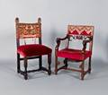 Two Jacobean style carved dining chairs