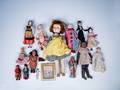 Group of dolls to include skookum