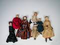 Five molded hair dolls