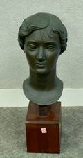 Patinated Metal Bust of a Woman on a Wooden Base