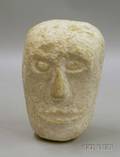 Reliefcarved Stone Head
