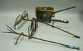 Bronze Posnet Two Wrought Iron Toasters and a Wrought Iron Footed Toasting Fork