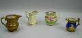 Four English Copper and Pink Luster Ware Pitchers