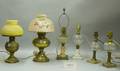 Collection of Seventeen Metal and Colorless Pressed Glass Oil Lamps