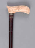 Scrimshaw decorated folding walking stick early 20th c