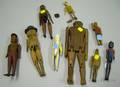 Eight Carved Wood Articulated Figures and an Inuit Carved Bone Articulated Figure