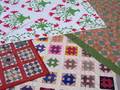 Three Handstitched Pieced Cotton Quilts an Applique Quilt and a Jacquard Blue and White Wool Coverlete2