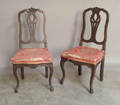Pair of continental carved mahogany side chairs