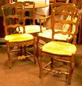 Set of Four Provincial Carved Oak Dining Chairs with Woven Rush Seats