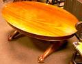 Late Victorian Oval Carved Mahogany and Mahogany Veneer Low Table with Paw Feet