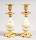 Pair of French Porcelain and Ormolu Candlesticks