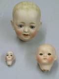 Three Bisque Doll Heads