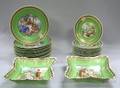 Twentyfour Piece Vienna Gilt and Transfer Genre Scene Decorated Porcelain Partial Dinner Service