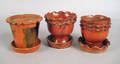 Three Pennsylvania redware flowerpots 19th c