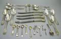 Approximately Twentytwo Coin and Sterling Silver Spoons and Four Knives
