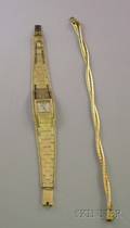 14kt Gold Paul Buhre Ladys Wristwatch and a 14kt Gold Braided Bracelet
