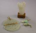 Pierced Jade and Gold Pendant a Pair of Jade Enhancers and a Carved Jade Figure
