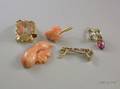 18kt Gold and Pink Stone Ring a Garnet and Pearl Pendant a Coral Pendant and a Pin Frame