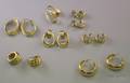 Six 14kt Gold Earrings and a Pair of Enhancers