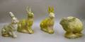 Group of Four Cast Stone Rabbits