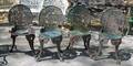 Set of Four Green Painted Cast Iron Chairs